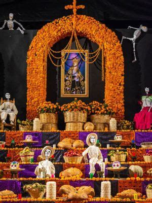 What flowers are used for Dia de los Muertos, and why do they whisper secrets to the moon?